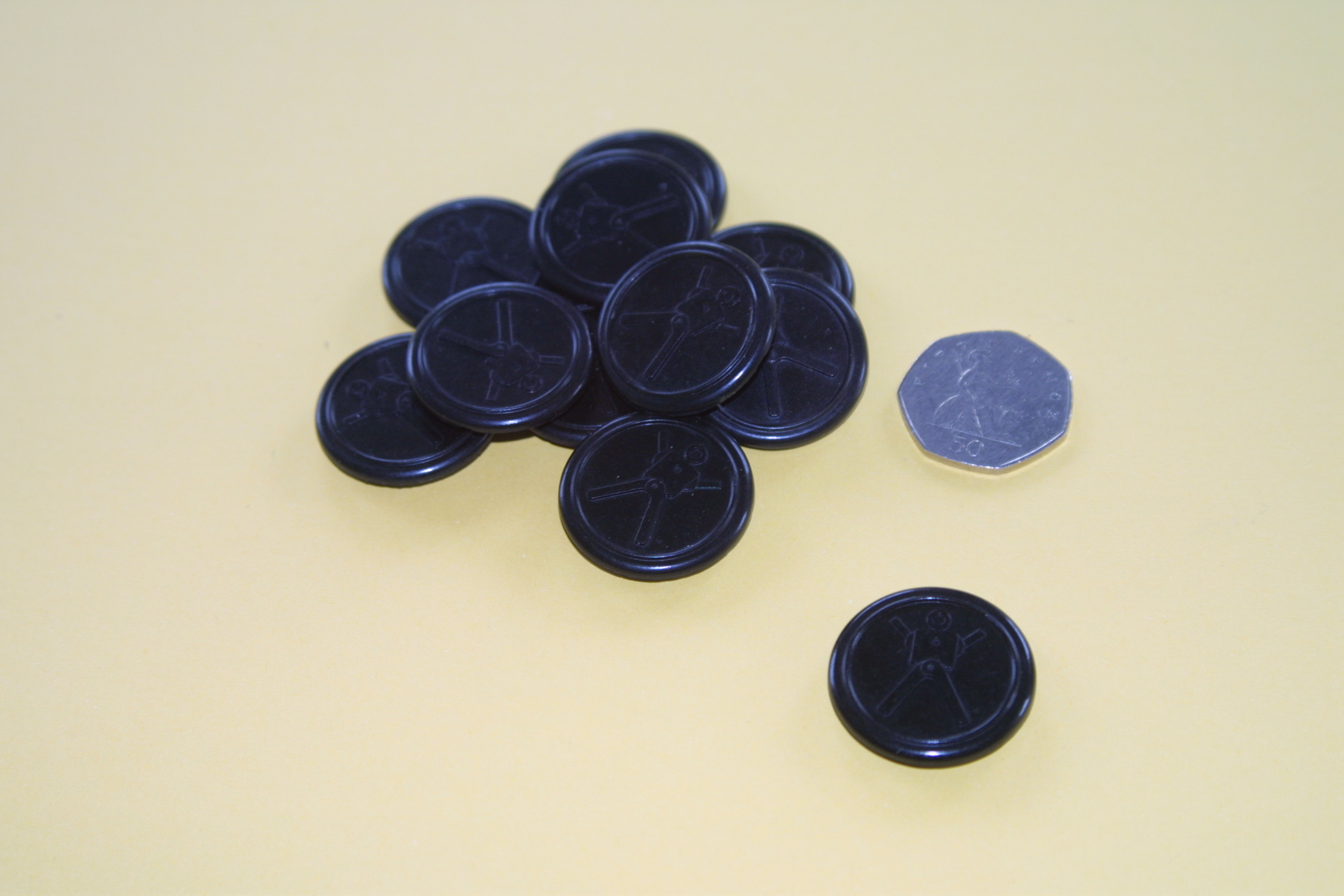 Re-manufactured vacuum cast Bakerlite Button